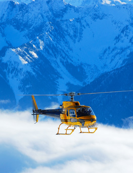Helicopter Above Clouds