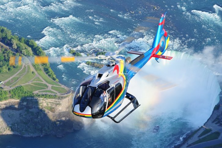 Niagara Helicopters flies Airbus H130 helicopter over Niagara Falls, Ontario